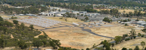 Future Bendigo BESS Site - artists impression of a portion of fields occupied by large batteries.